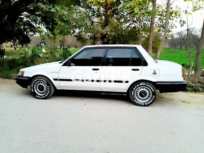 Toyota Corolla DX Saloon 1986 for Sale in Malakand Agency