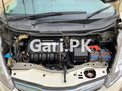Honda Fit 1.3 Hybrid Navi Premium Selection 2011 for Sale in Sahiwal