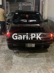 Toyota Corolla DX Saloon 1985 for Sale in Peshawar