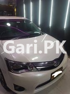 Toyota Corolla Axio Hybrid 1.5 2013 for Sale in Karachi