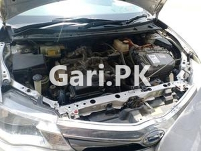 Toyota Corolla Axio Hybrid 1.5 2014 for Sale in Karachi
