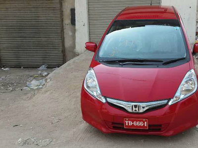 Honda Fit - 0.7L (0700 cc) Red