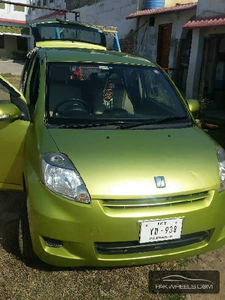 Toyota Passo - 1.0L (1000 cc) Yellow