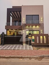 Low Budget Brand New Luxury 5 Marla villa House is in Bahria Town Lahore Bahria Town Sector E