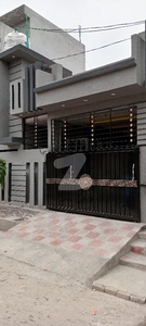 5 .5 Marla Beautiful Brand New House For Sale In Samarzar ElectricityWater Boor Gas Available Front Location In Street .25 Feet Street Big Car Porch. Samarzar Housing Society