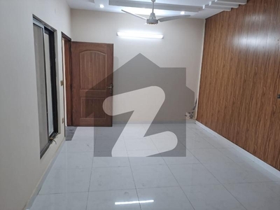 10 Marla Lower Portion For Rent 2 Bedroom TV Lounge Kitchen With Garage Total Marble Floor Elec Water Gas Available Wapda Town Phase 1 Block F2