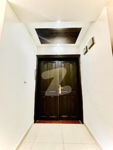 new building slightly used 3 bedrooms flat available urgent for rent Askari 10 Sector F