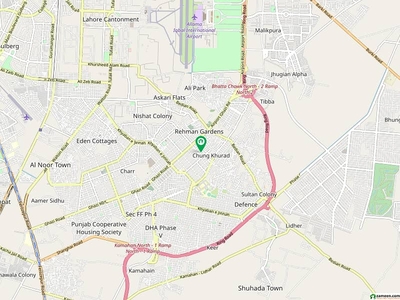 Plot number near 390 Q. Excellently located plot near Ghazi Road, Petrol Station, Schools, Mosque and Commercial Markets