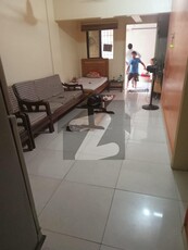 FLAT FOR RENT GROUND FLOOR 2 BED ATTACHED BATH ROOM. ONE AMERICAN KITCHEN TILES FLOORING EXTRA LAND WEST OPEN CAR PARKING BOUNDARIES WALL SECURITY GUARDS NEARBY HASAN SQUARE BLOCK 13A Gulshan-e-Iqbal Block 13/A
