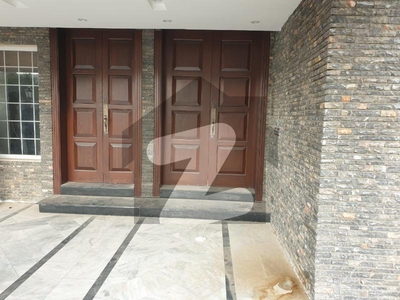 1 KANAL Beautiful 3-Bedroom Upper Portion Available For Rent in Prime Location