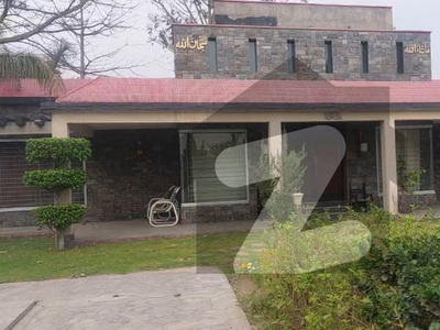 9 Kanal Farm House For Sale Along With Lush Green Area And Other Facilities You Get Swimming Pool And Space For Barbeque And Ideal Location Bedian Road