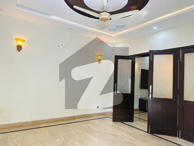 12 marla lower portion available available for rent in overseas A block bahria town Lahore beautiful house near to park masjid and market Bahria Town Sector C