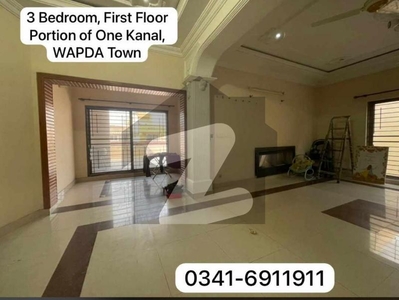 Portion For Rent Proper 3 Bed Room TV Lounge Terrace Garage Etc.Hot Location Near Market Masjid Parks Wapda Town