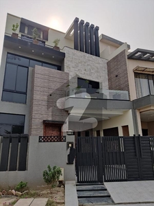 5 Marla Brand New House for sale on 30 fit road near to park Lake City Sector M-7C