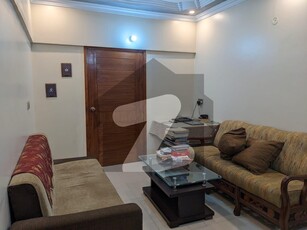 Well maintain 1st floor 3 bed drawing dinning tyled flooring flat available for sell in Al firdous appartment block 2 main road imtiaz Gulshan-e-Iqbal Block 2