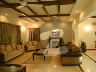 ONE KANAL RENOVATED BUNGALOW WITH LUSH GREEN LAWN FULLY FURNISHED DHA Phase 4
